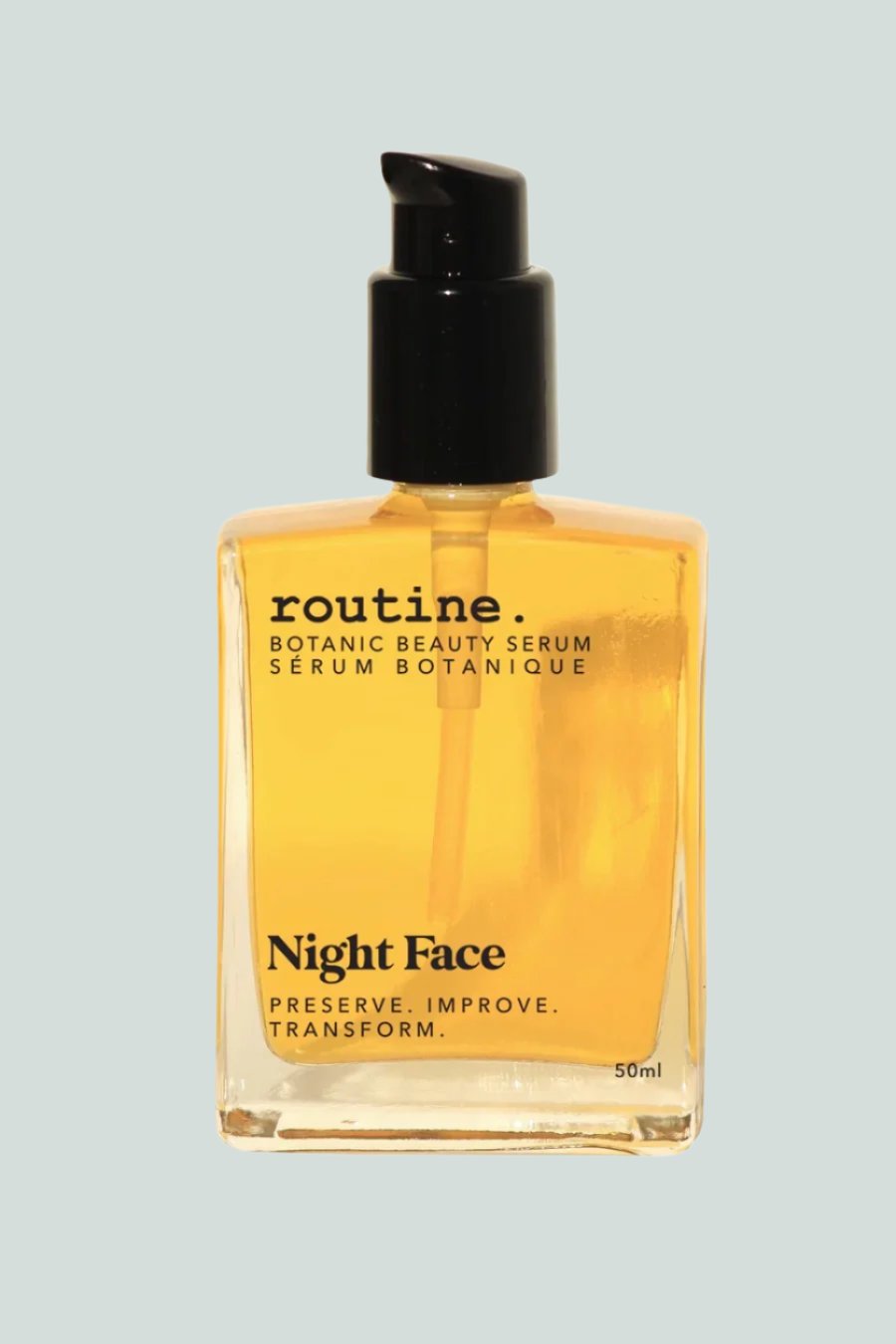 Night Face Serum - by Routine - Photographed with a white background - both clear oil bottle with black cap - labelled NIGHT FACE on the bottle