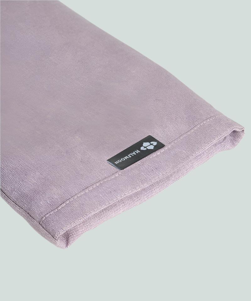 Close up of Iris coloured Linen - Hot Cold Therapy Pillow by Halfmoon Yoga, photographed on a white clean background.