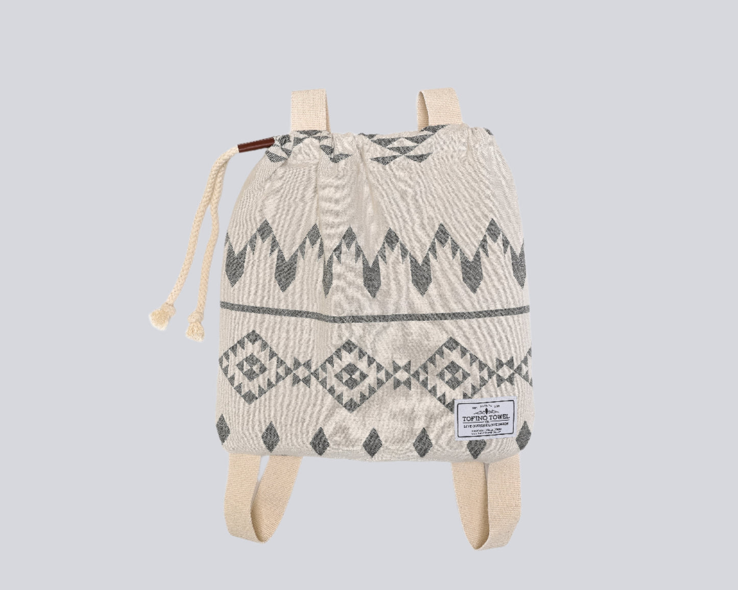 The Day Tripper Towel Backpack in Granite colour - on a white backdrop