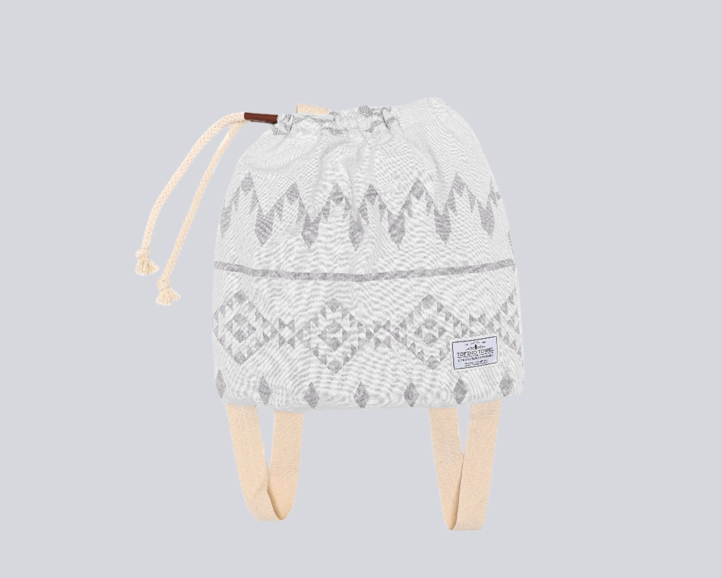 The Day Tripper Towel Backpack in Pewter colour - on a white backdrop