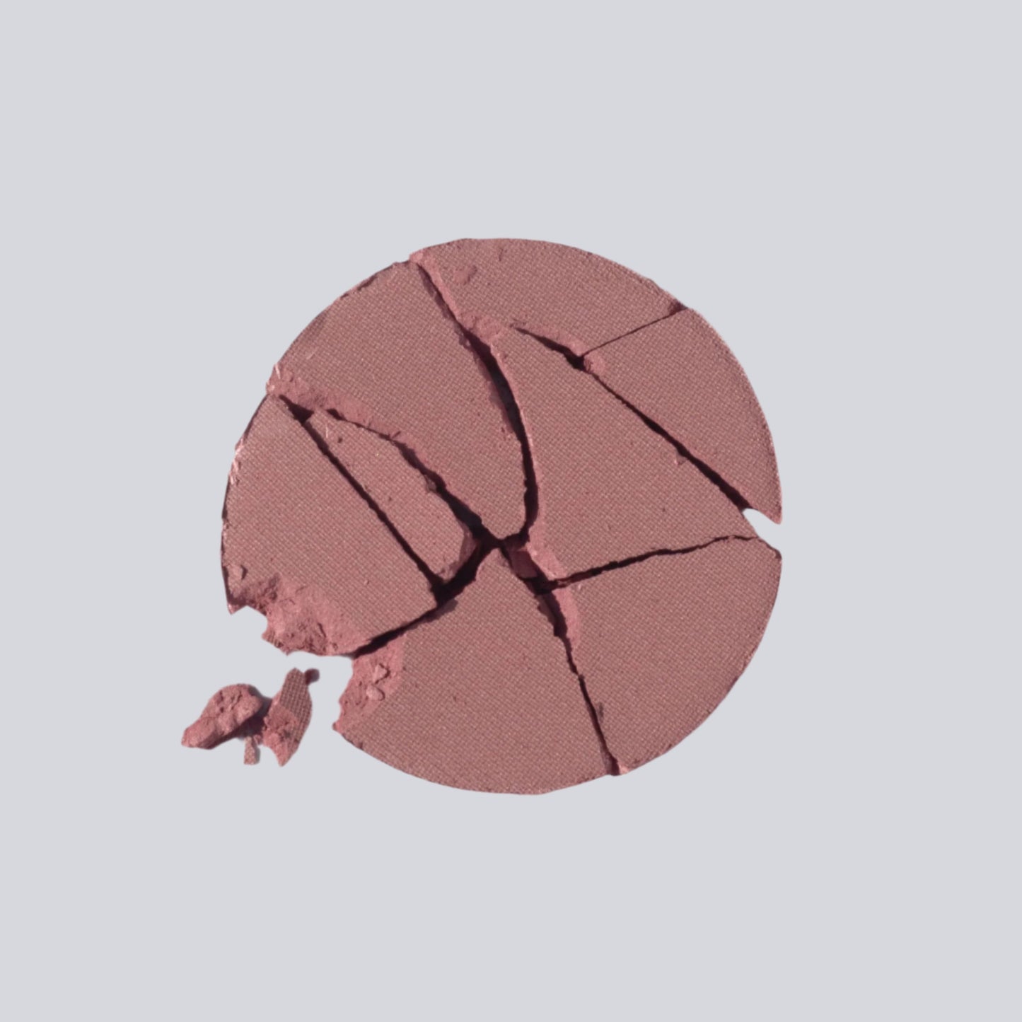 Go - Soft Muted Pink - multi use pressed shadow + blush colour - broken palette displayed on a white background.