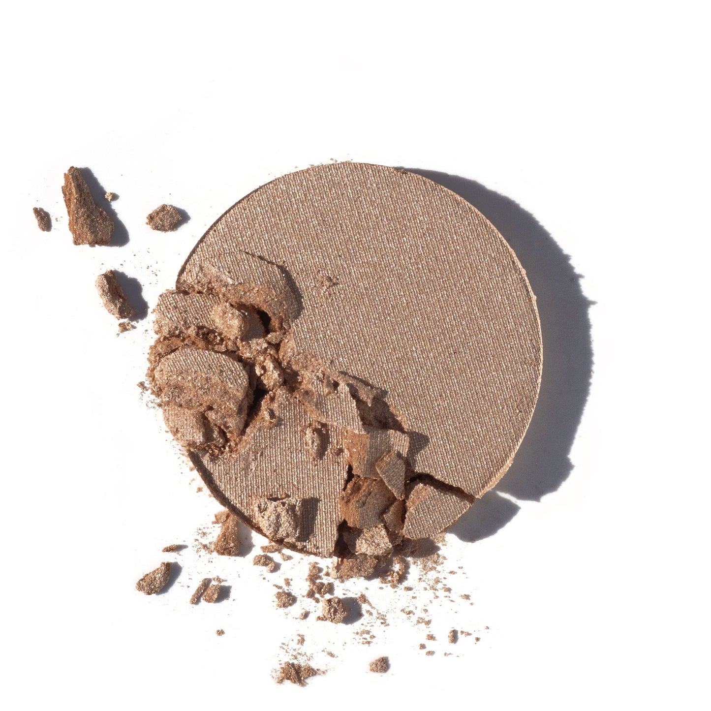 Golden Hour - Illuminating Warm Highlight - multi use pressed shadow + blush colour - broken palette displayed on a white background.