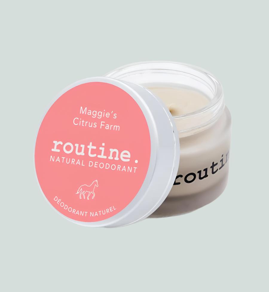 Peach Sticker on Jar with white horse. Open lid of Routine Natural Deodorant Cream - Maggie's Citrus Farm