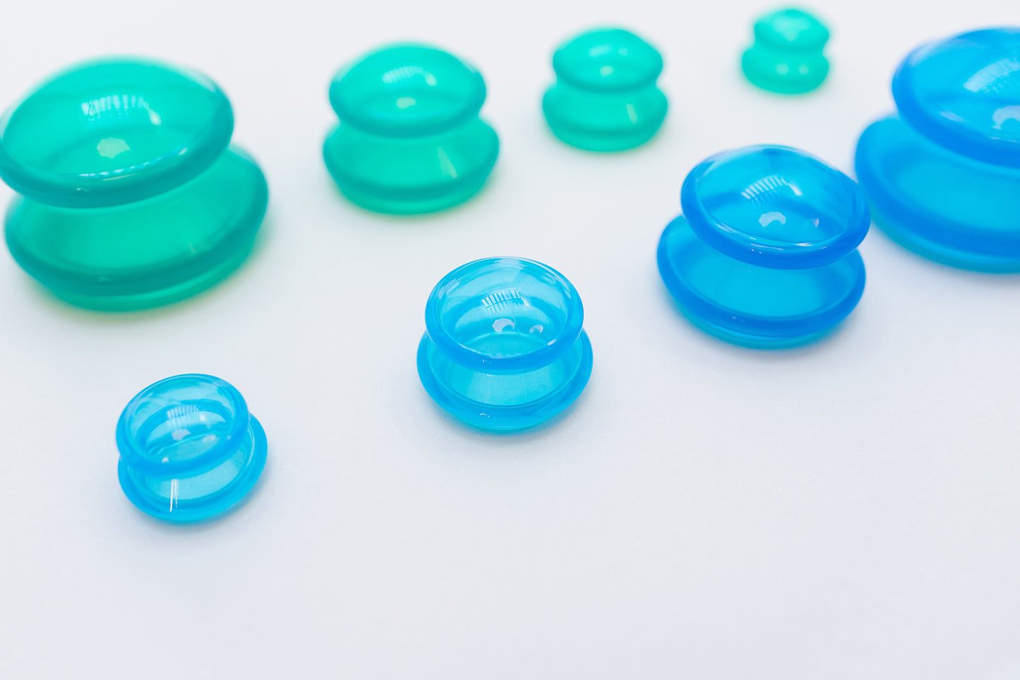 One set of Green Body Cups and One Set of Blue Body Cups - 4 in each set