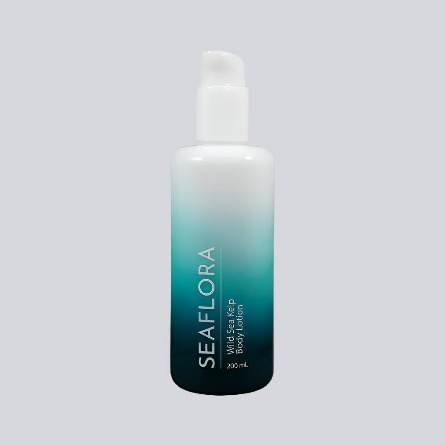 Seaflora - Wild Sea Kelp Body Lotion in white fade bottle to aqua and dark aqua - vertical white branding of Seaflora label