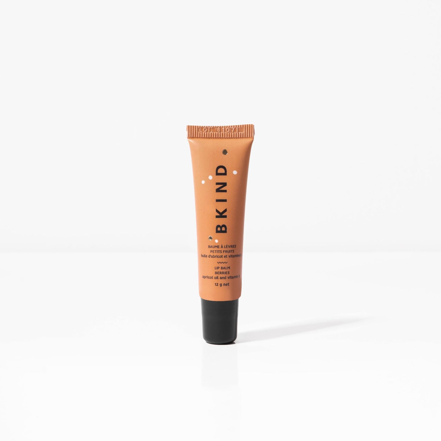 BKIND lip balm - berries - displayed on a white background with the orange/brown tube and BKIND written vertically on the tube.