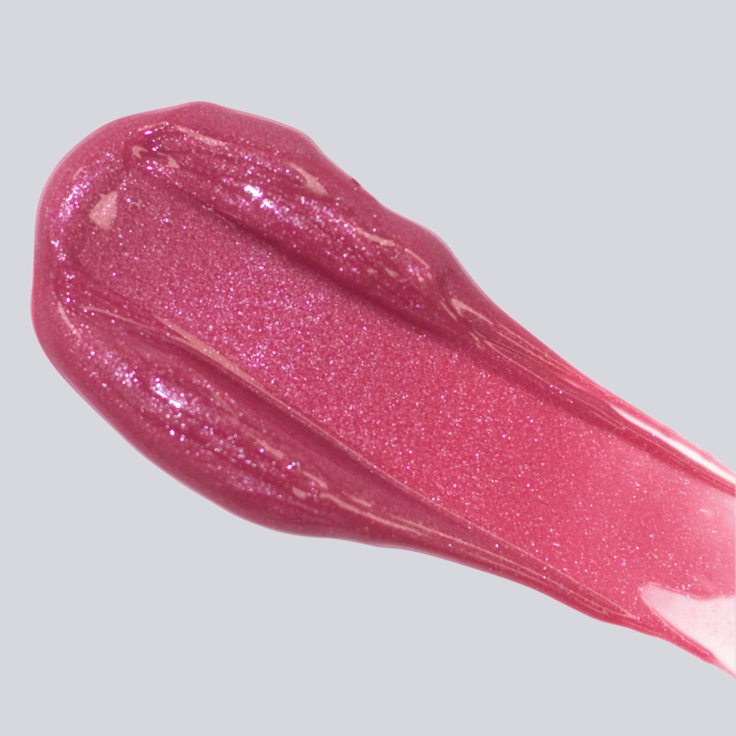 FitGlow Lip Serum - Bloom - sheer berry shine colour with white background