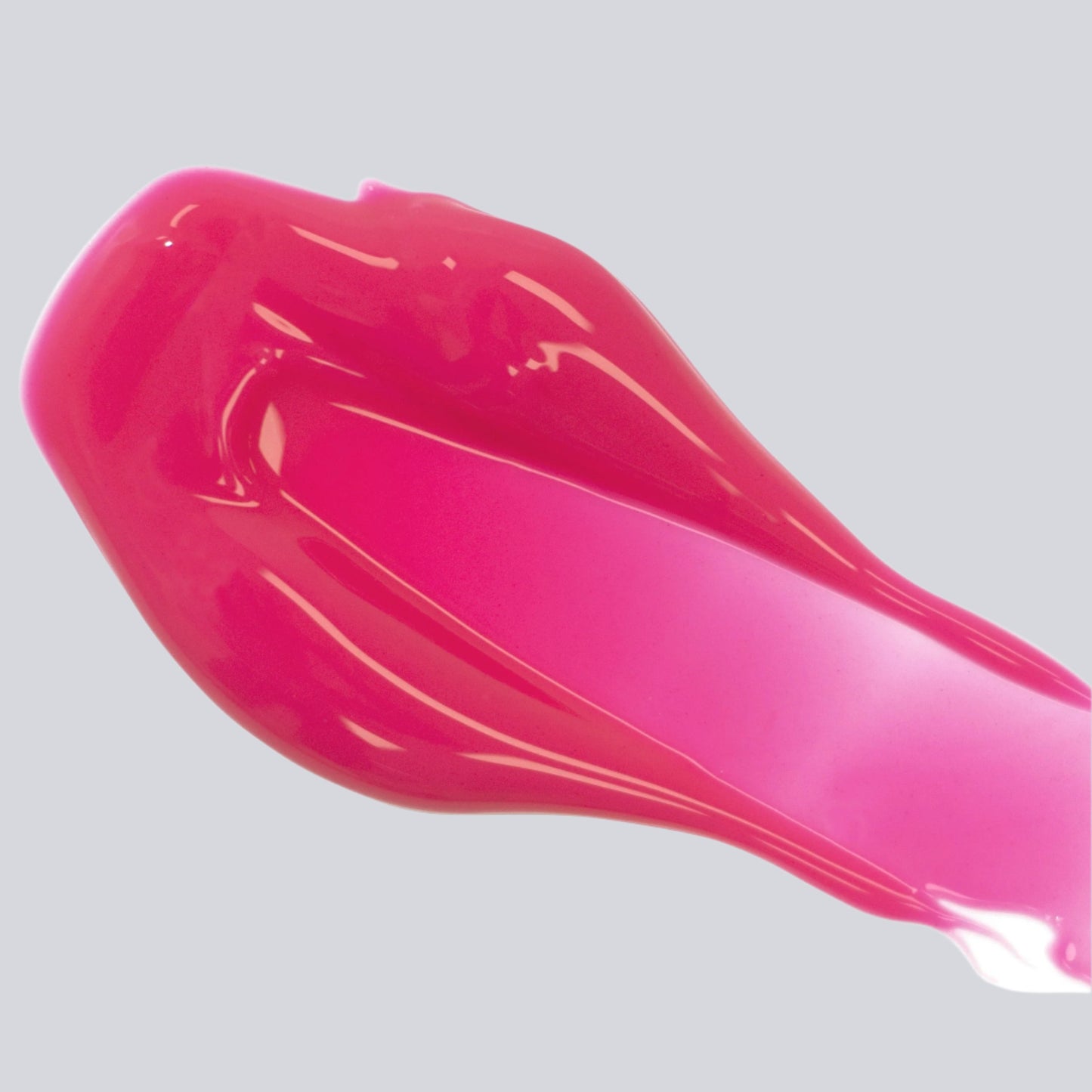 FitGlow Lip Serum - Liv - sheer magenta colour shown as a smear of lip serum on a white background