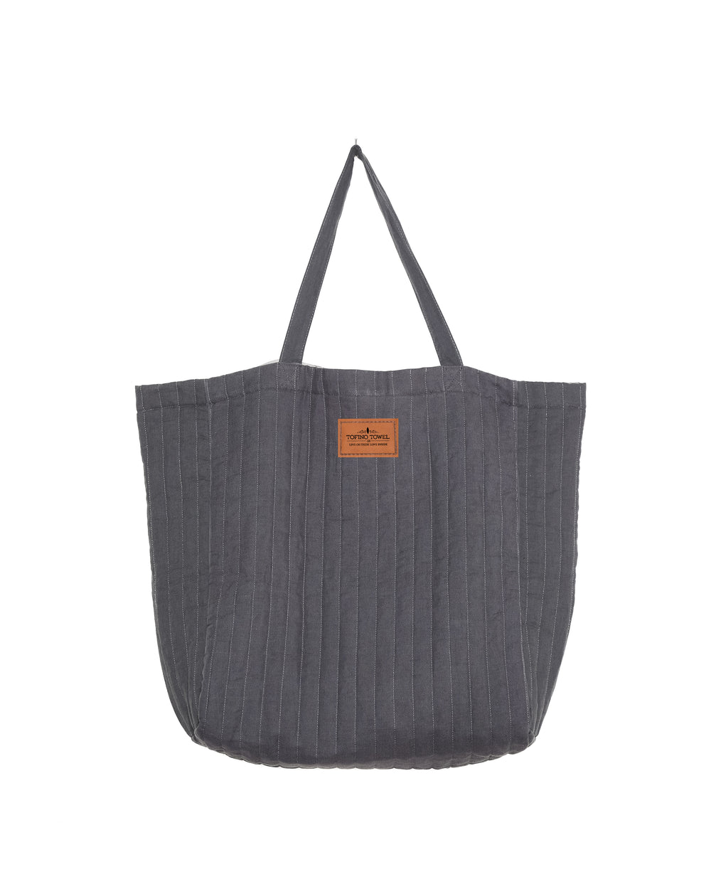 Charcoal ESME oversized quilted tote - photographed on a white background with tan label of Tofino Towel
