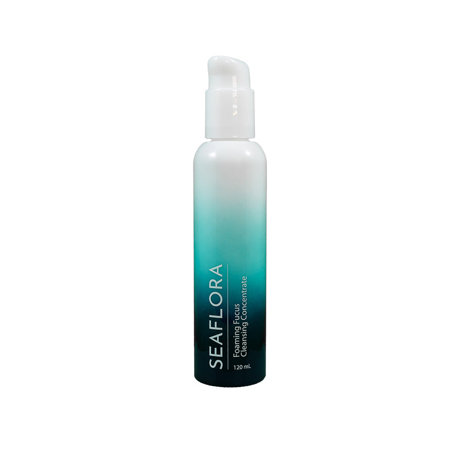 Seaflora - Foaming Fucus Cleansing Concentrate in white fade bottle to aqua and dark aqua - vertical white branding of Seaflora label