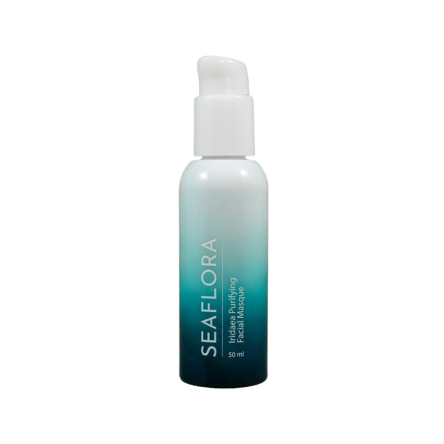Product shot of Seaflora - Iridaea Purifying Facial Masque shown on a white background - in white fade bottle to aqua and dark aqua - vertical white branding of Seaflora label